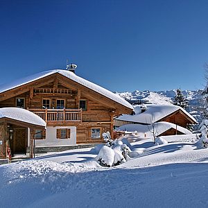 house in the winter with snow